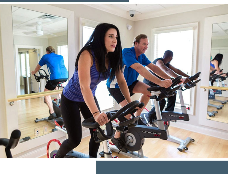 Residents making use of the Fitness Center at the Manor House at Markland | Amenities at the Markland Home Community in St. Augustine, Florida.